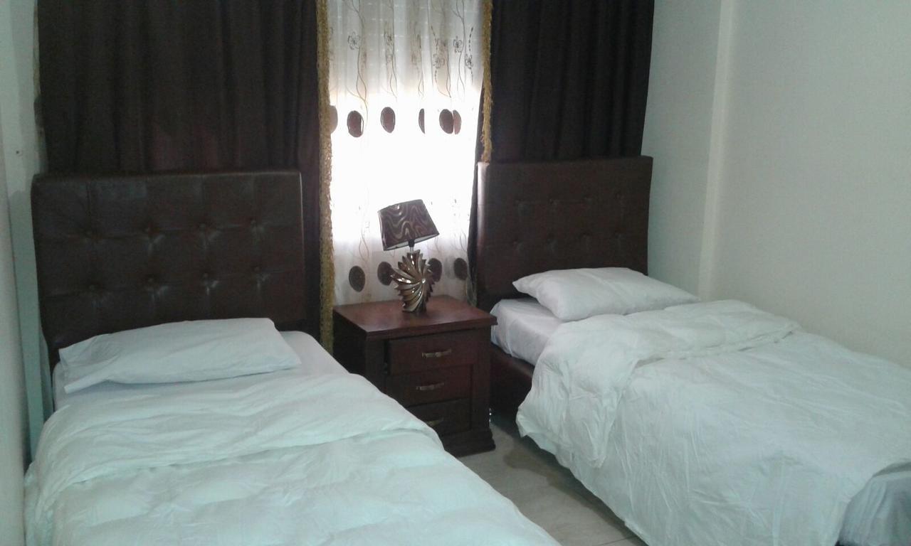 Al Tawheed Hotel Apartments Amman Buitenkant foto