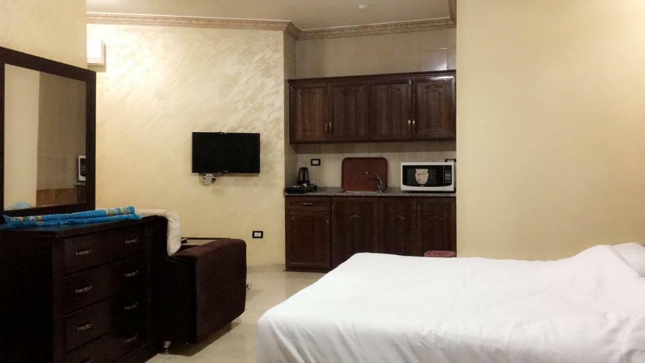 Al Tawheed Hotel Apartments Amman Buitenkant foto